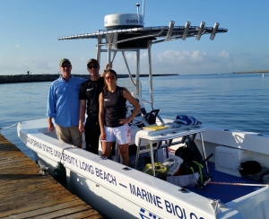 Two Shark Lab grad students prepare for an expedition with Dr. Chris Lowe.