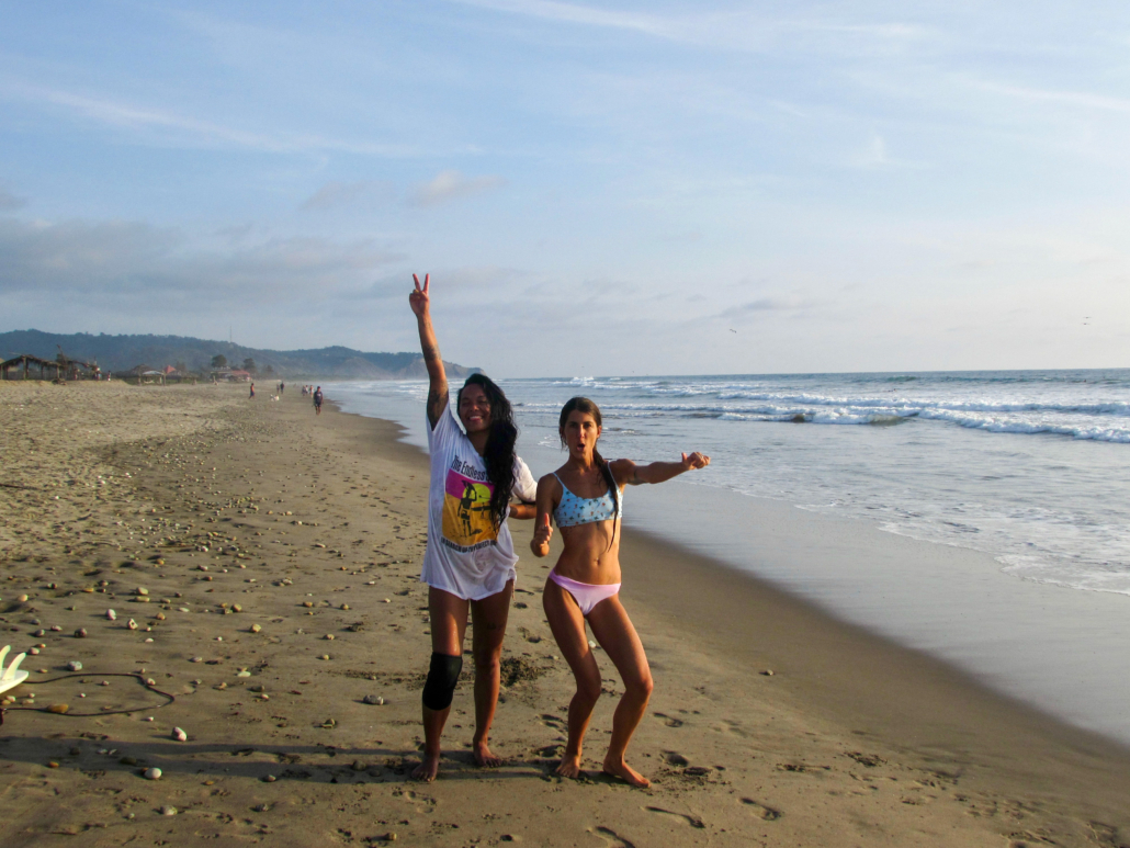 surfer girls dancing on the beach